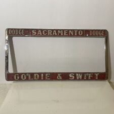 Vintage Sacramento Goldie &Swift Dodge Metal Embossed License Plate Frame picture