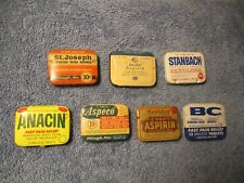 Lot of 7 vintage/antique aspirin metal tins, some with content. picture