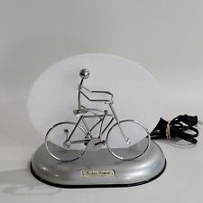 Vintage Solar Power by Ishiguro - Motion Man Pedaling Bicycle Table Lamp picture
