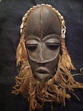 African Tribal Dan Mask.  Wood and Cowrie shells. Early 20th C picture