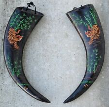 Pair of Asian buffalo horn wall hanging with scrimshaw art of tiger in forest picture
