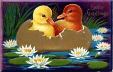 Easter Postcard Two Ducks Sitting in Gold Broken Eggshell Boat Floating in Lake picture