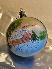 Christmas ball with house covered with snow. 3.5