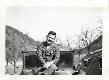 Snapshot B/W Photo 1960 Korea US Army Soldier Sitting on Hood of Truck picture