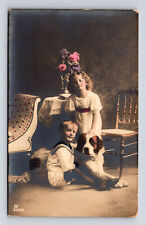 RPPC Hand Colored Portrait Young Boy & Girl Large Dog St Bernard? Postcard picture