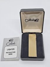 Vintage COLIBRI Gold Tone Slim Cigarette Lighter with Original Box & Instruction picture