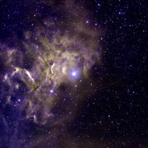 The star AE Aurigae, embedded in a region of space containing smoke-like filaments of carbon-rich dust grains. Such dust might be hiding deuterium and stymieing astronomers' efforts to study star and galaxy formation.