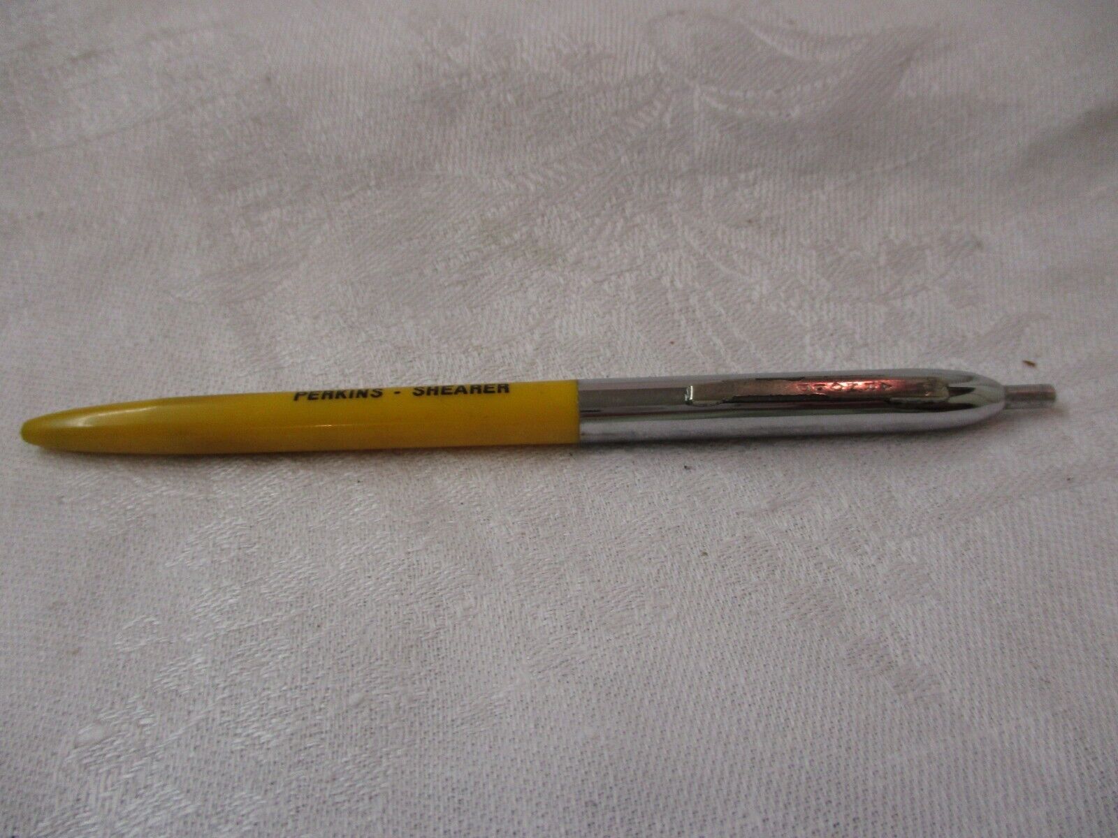 Vintage Arnold yellow chrome Ballpoint Pen Advertising Perkins Shearer
