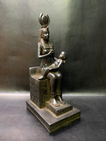In a perfect scene ISIS the motherhood goddess breastfeeding Horus as a baby