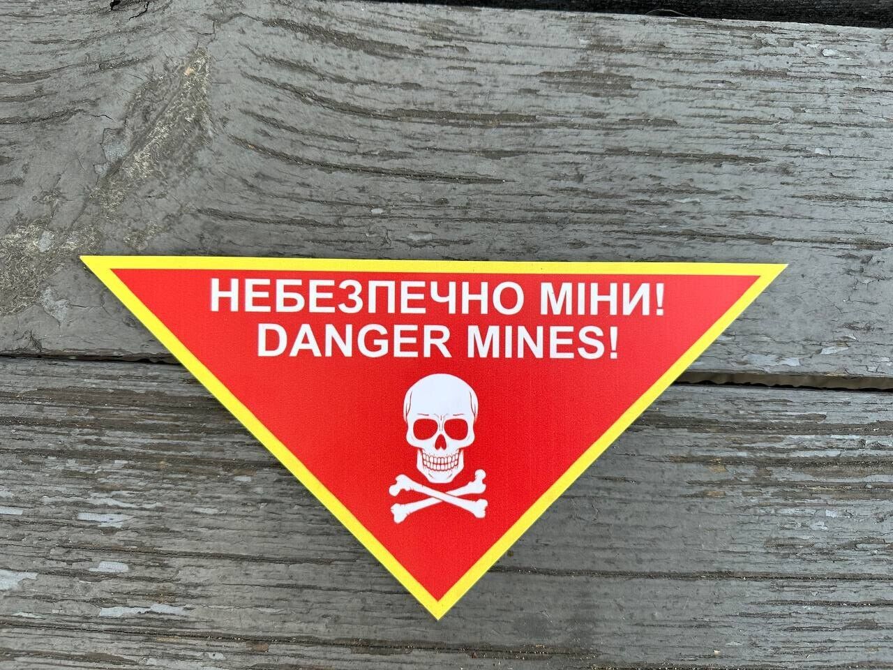 UKRAINE Caution sign Watch out for mines