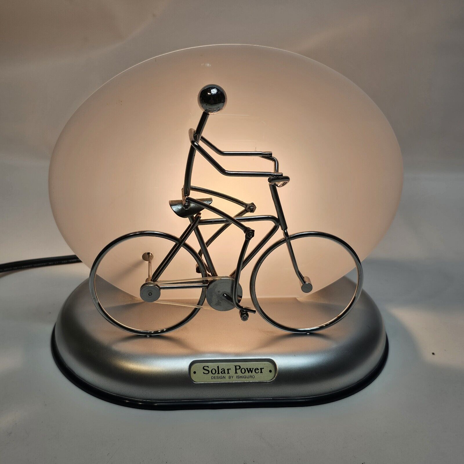 Vintage Kinetic Solar Power Ishiguro Motion Man Pedaling Bicycle Bike Light Lamp