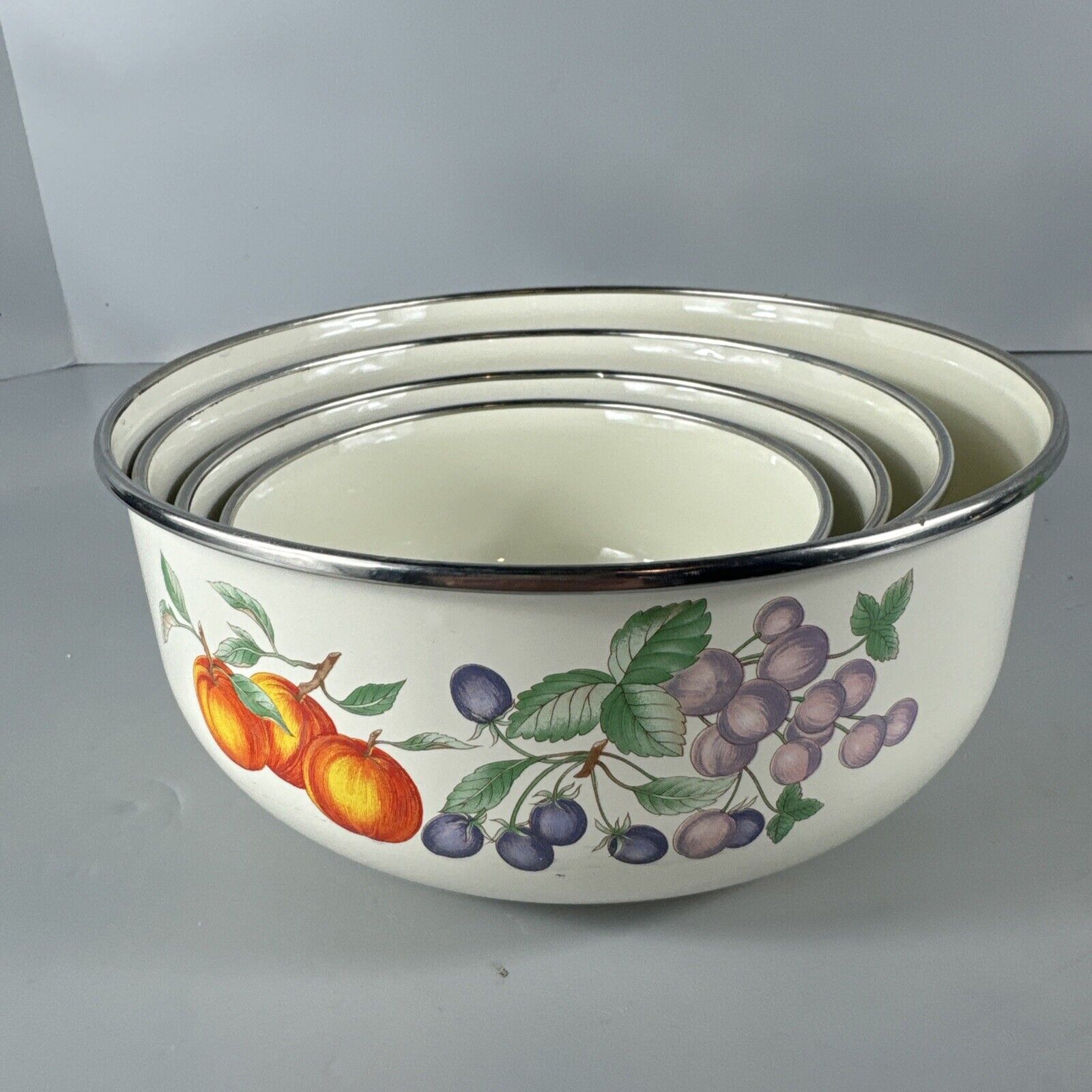 Vintage Set Of 4 Nesting Enamel Mixing Bowls With Orange And Purple Fruit
