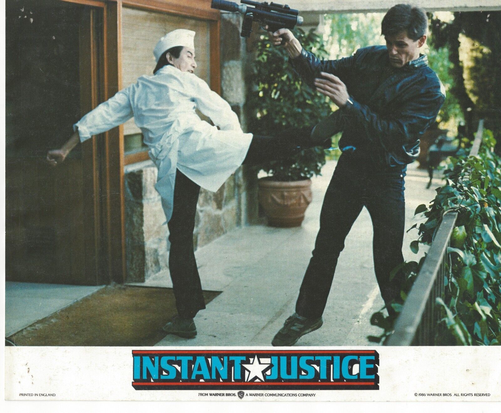 Instant Justice~Michael Pare~Press Photo~1986~UZI Gun Chef Karate Kick Revenge