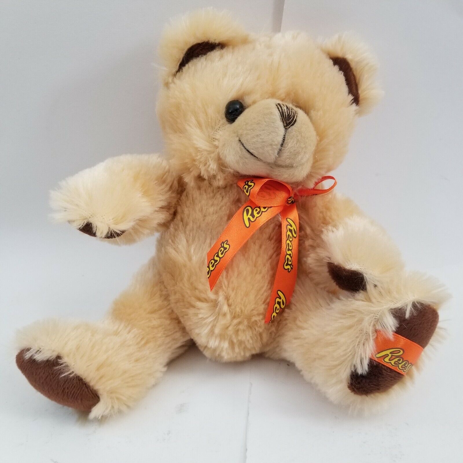 Reeses Ad  Stuffed Bear Light Brown plush with an orange ribbon and bow 