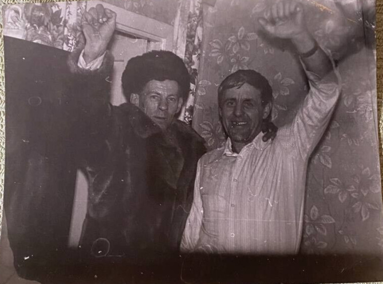 Two handsome guys under the influence of alcohol are swaying. USSR vintage