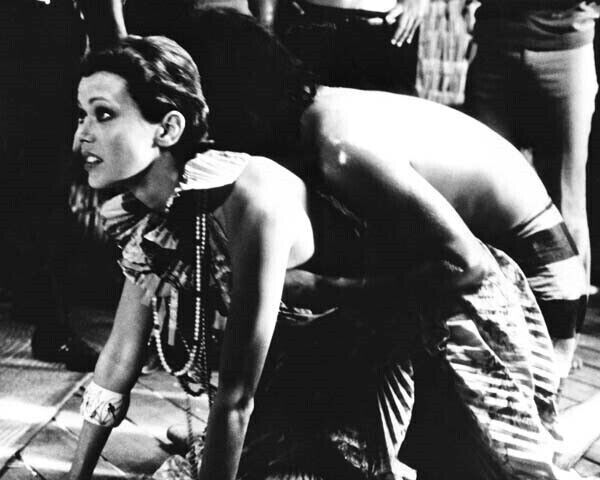 Emmanuelle 1974 Sylvia Kristel kneels on floor man behind her 5x7 photo