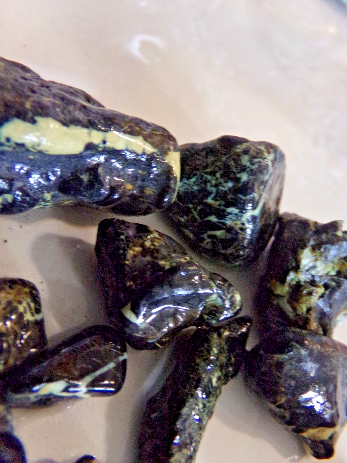 Turquoise from Lander Co. Nv Yellow & Black Tumbled & Rough 188g Damele