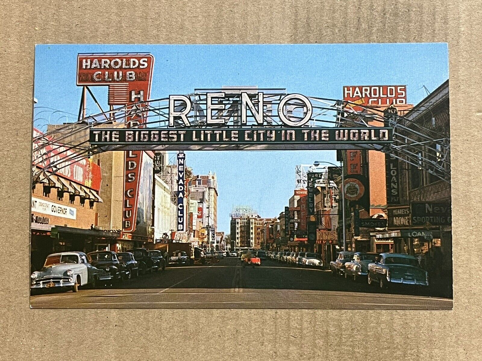 Postcard Reno NV Nevada Arch Sign Harolds Club Casino Old Cars Virginia Street