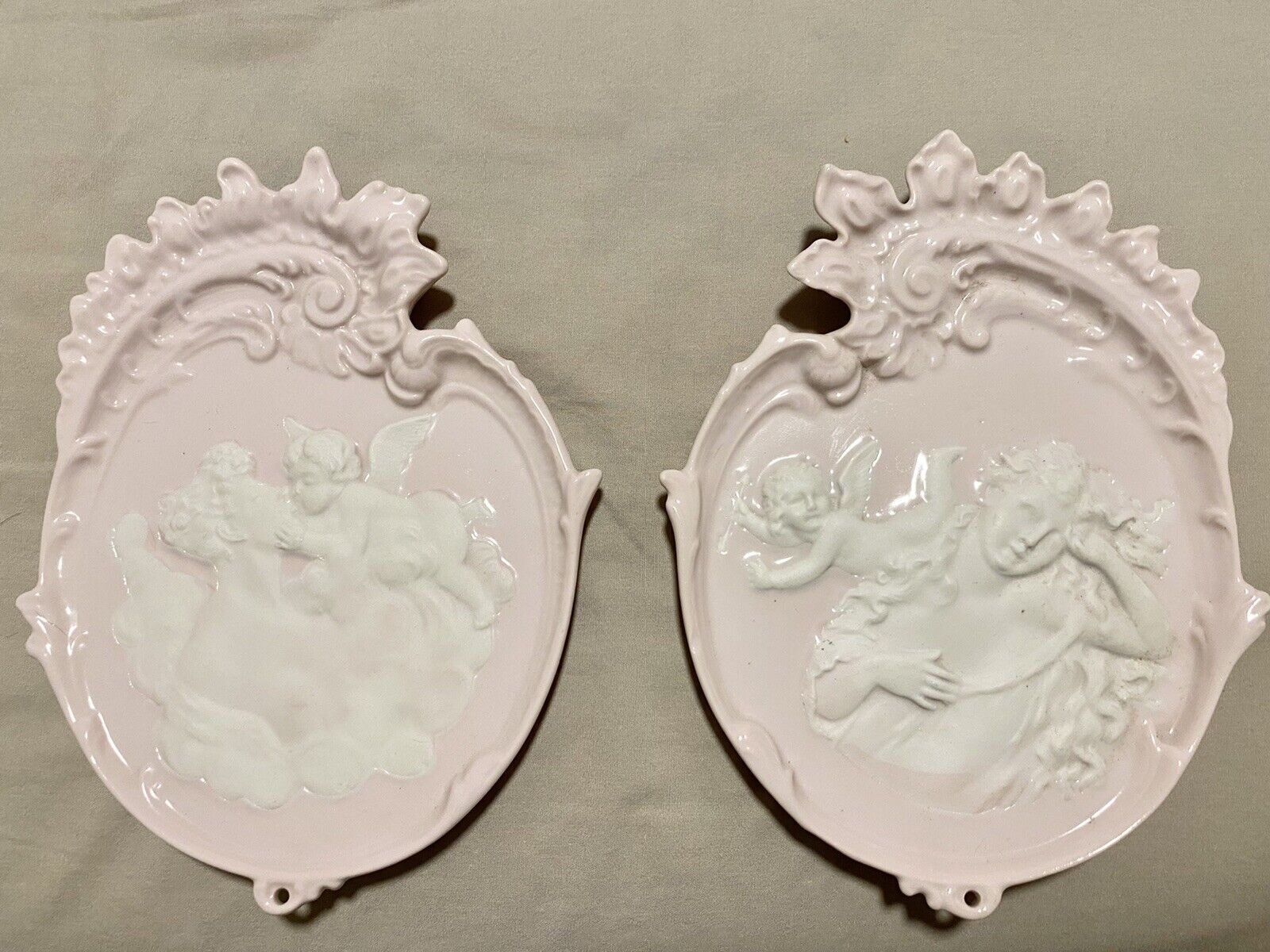 angels pink and white ceramic wall plaque