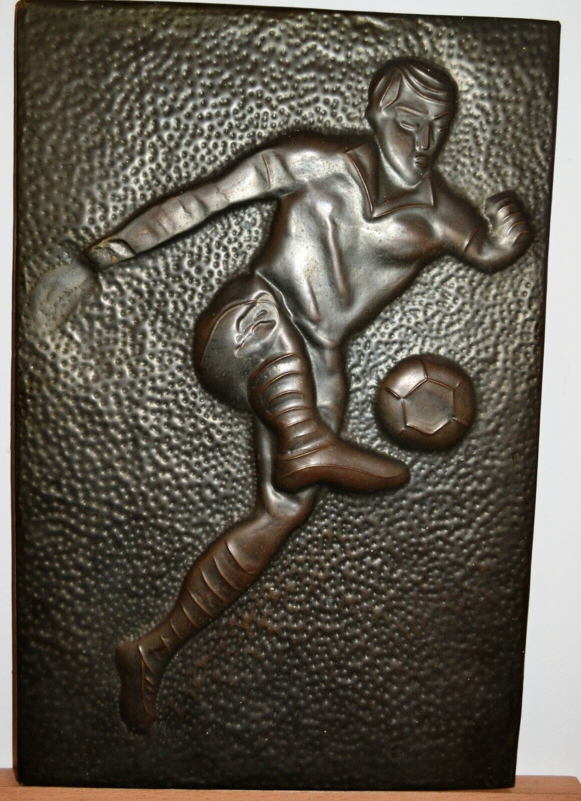 VINTAGE COPPER HAND HUMMERED RELIEF IMAGE OF FOOTBALLER
