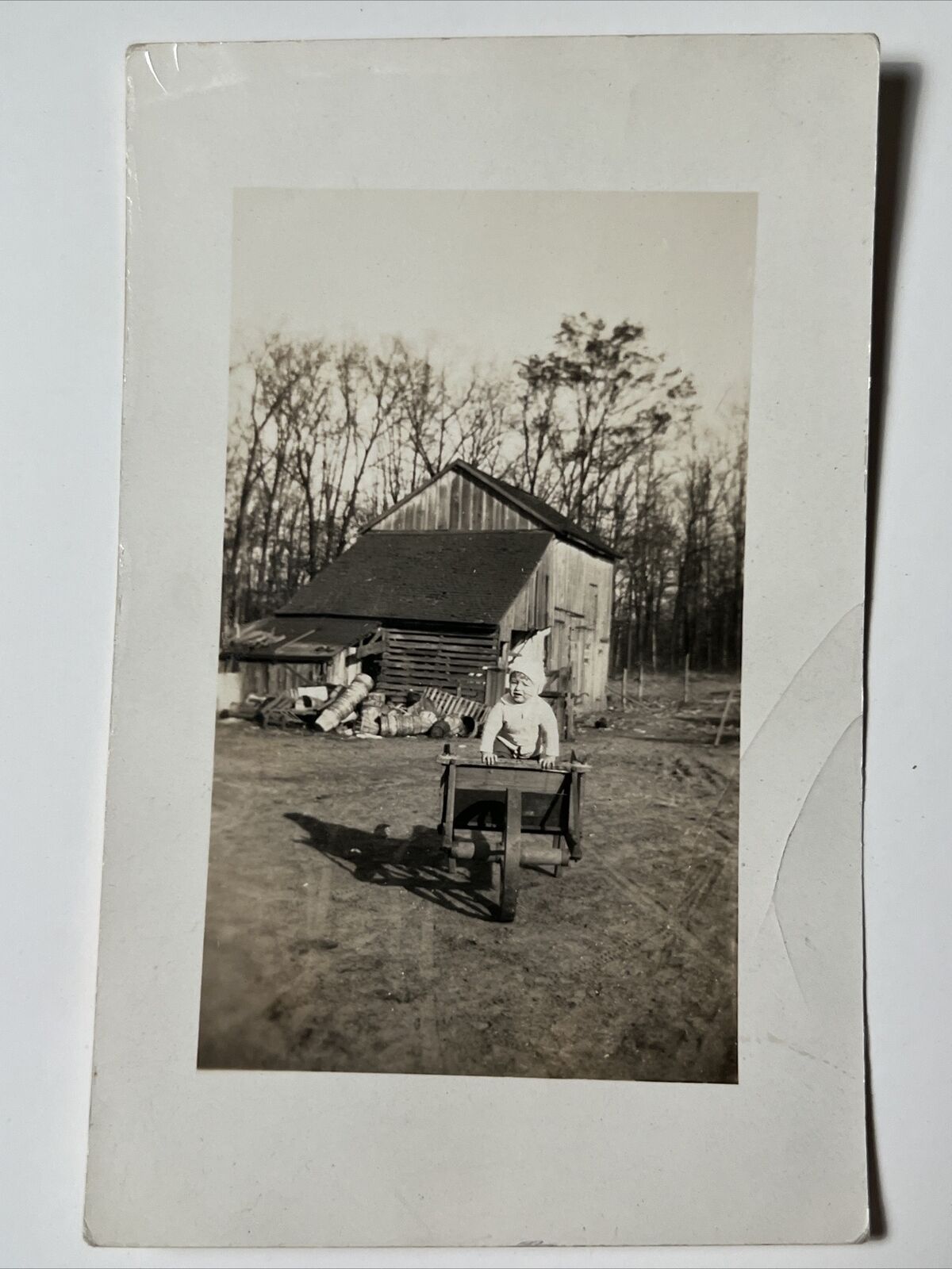 1901 TODDLER Playing on the FARM near old Barn  RPPC Real Photo Postcard