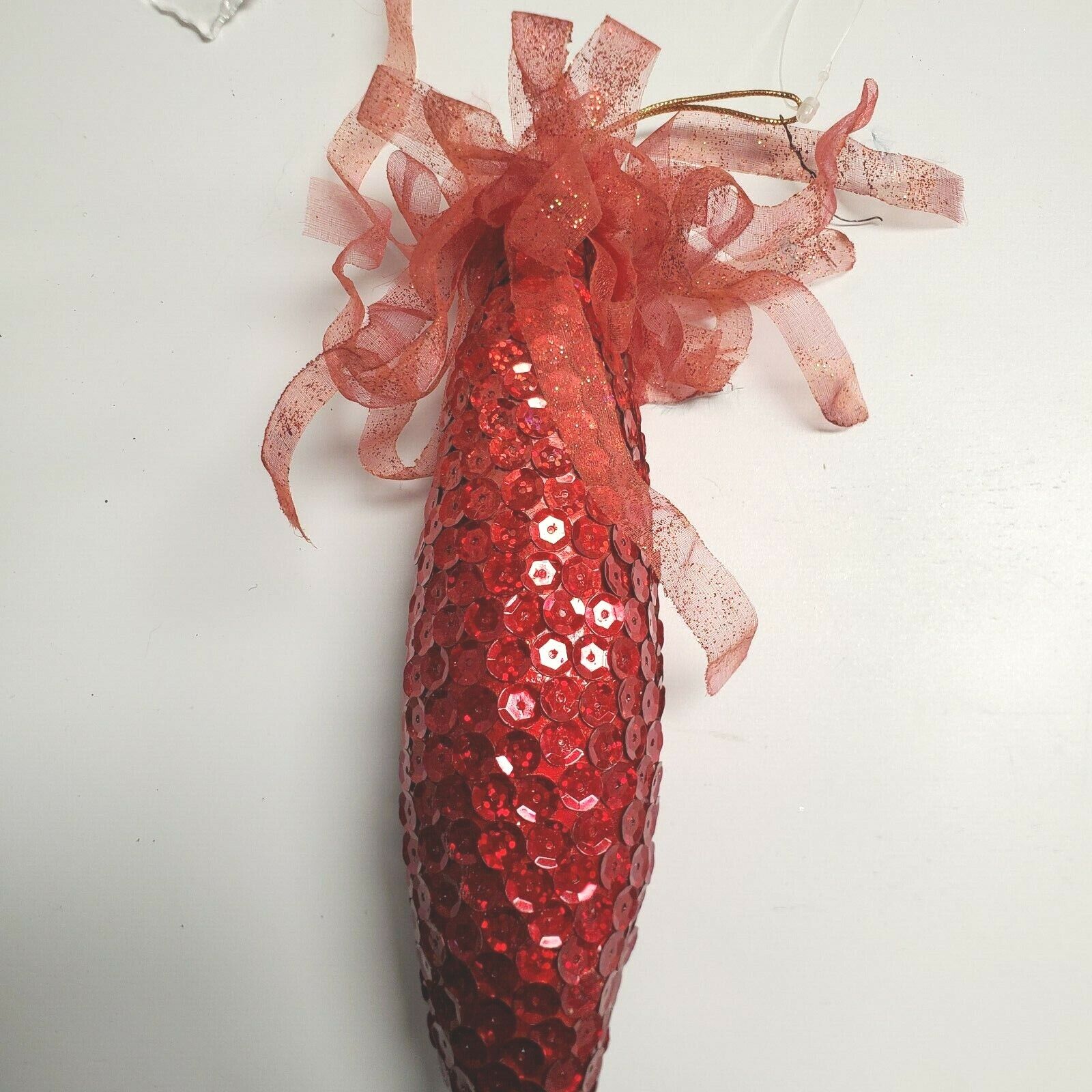 1 Sequin Encrusted Red Ornament With Sheet Glitter Ribbon on top Christmas