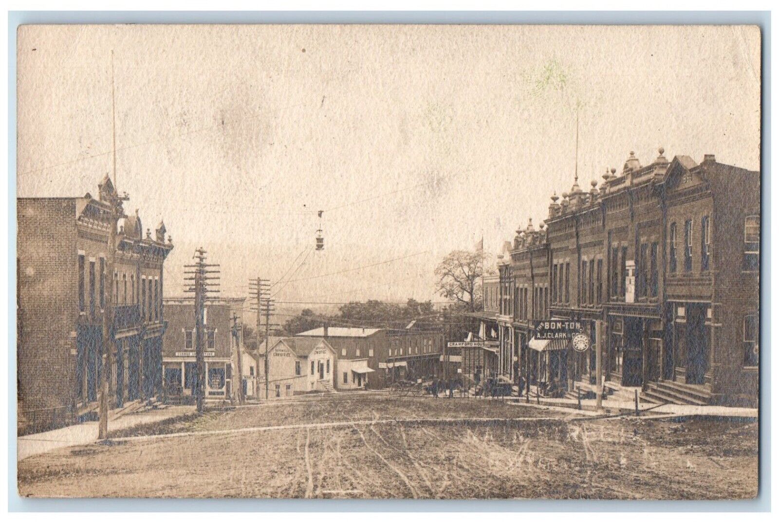 1907 Main Street View Bon-Ton Crawford House Cattaraugus NY RPPC Photo Postcard