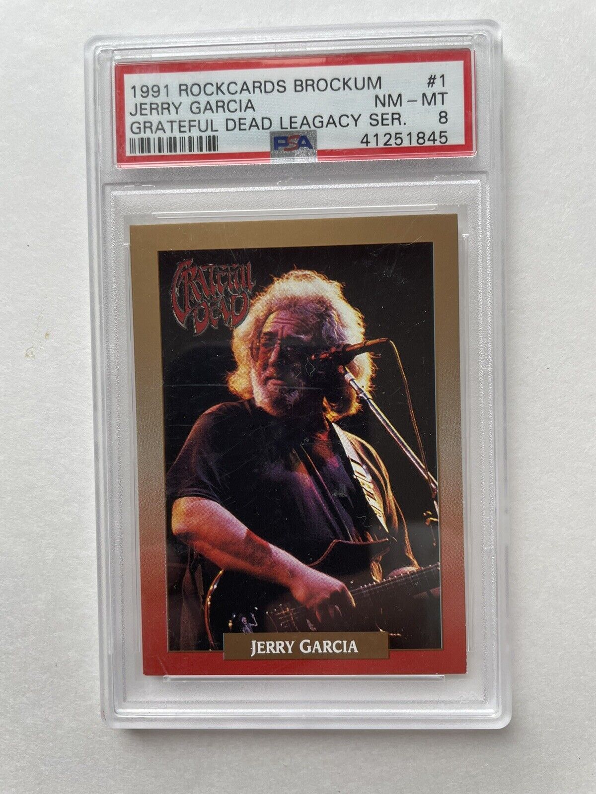 Jerry Garcia-1991 Rockcards Brock I'm #1 Grateful Dead Legacy Card PSA 8 NM-MT