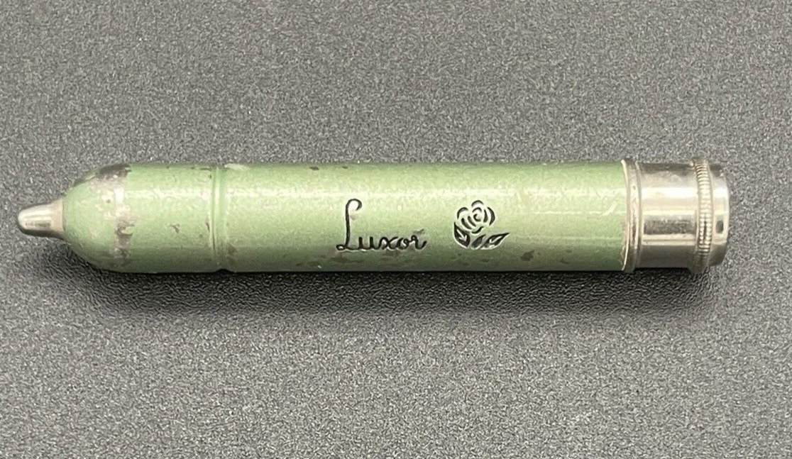 Vintage 1930s Luxor Powder Dispenser Pen Translucent color  some powder inside