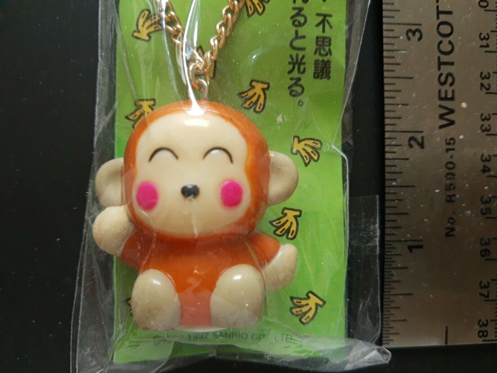 1997 Sanrio Monkichi Light Up Figure for cell phone?