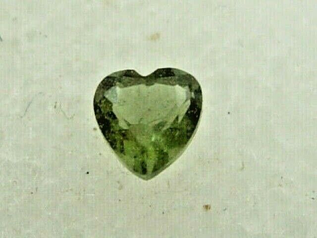 .116 carat Moldavite Faceted Heart Czech Republic Meteorite impact about 3x3x2mm