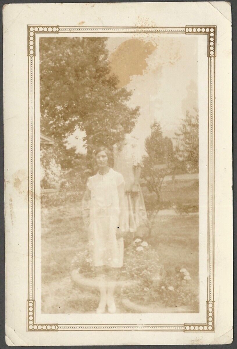 Woman in Garden with Ghost Twin Spooky Double Exposure Effect Vintage Snapshot
