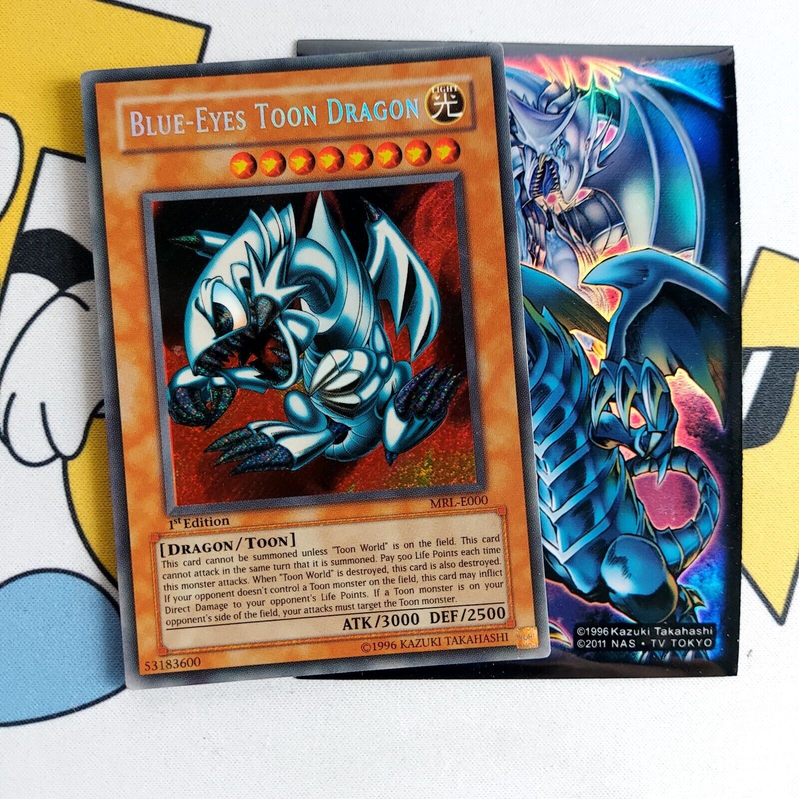 Yu-Gi-Oh Blue Eyes Toon Dragon MRL - E000 1st Edition Secret Rare Magic Card