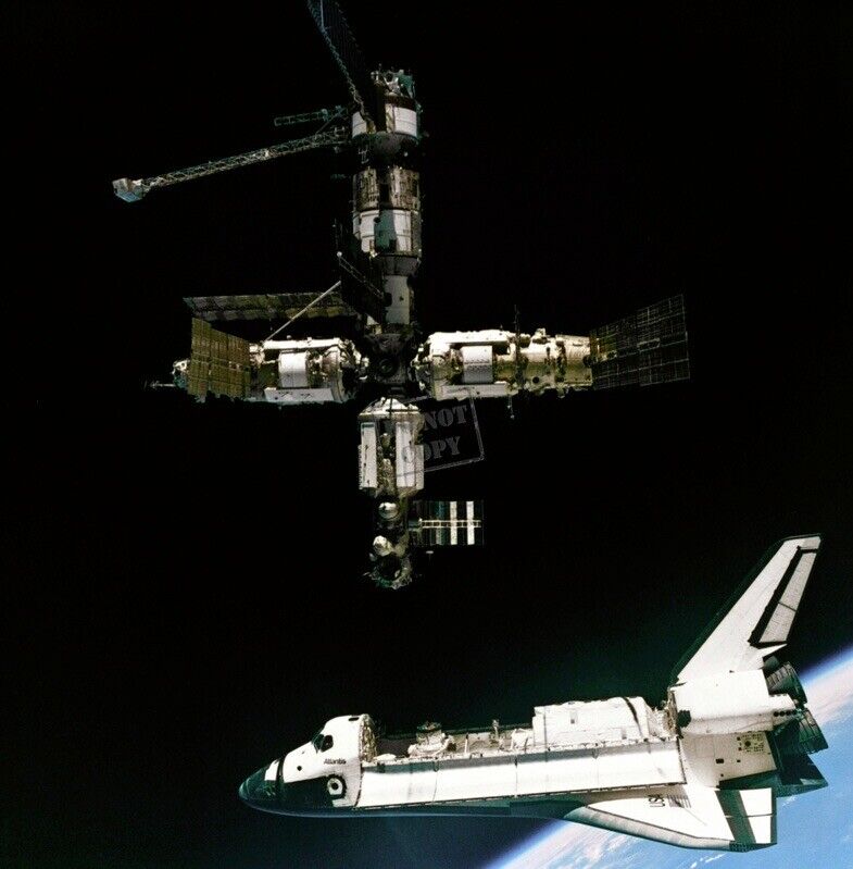 STS-71 Mir Russian Space Station departs Space Shuttle Atlantis 12X12 PHOTOGRAPH