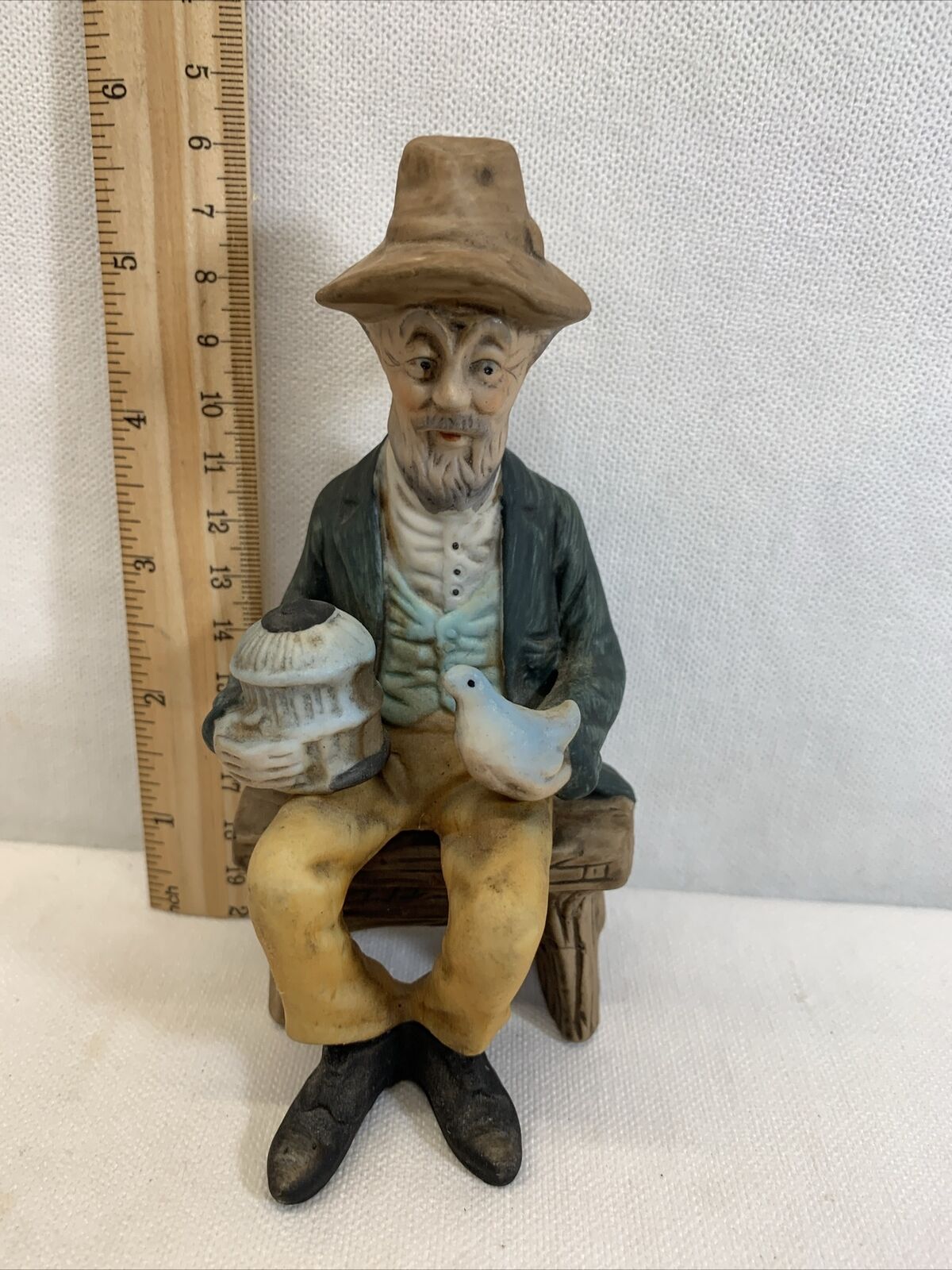 Vintage Figurine, Old Man on Bench with with a birdcage and a pigeon, very old