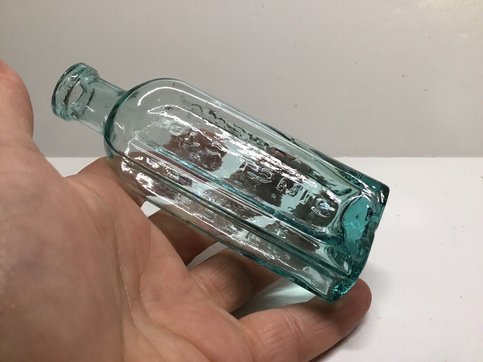 Antique Aqua Colored Lung Tonic Medicine Bottle.