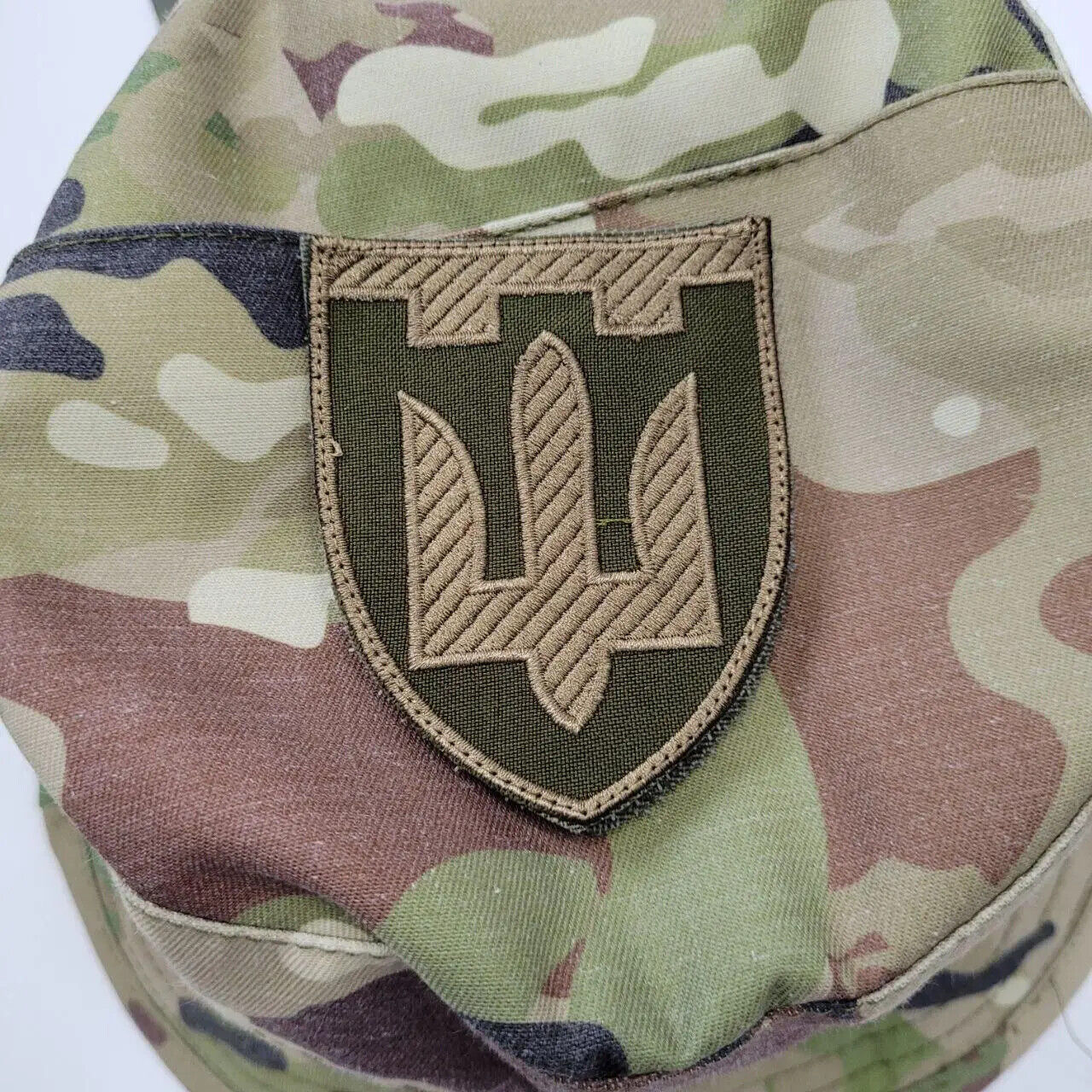 Embroidered military tactical patch of the army of Ukraine trident .