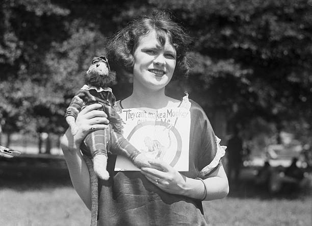 Monkey Doll and Slogans Help Relieve Tension at Dayton Humor and - 1925 Photo