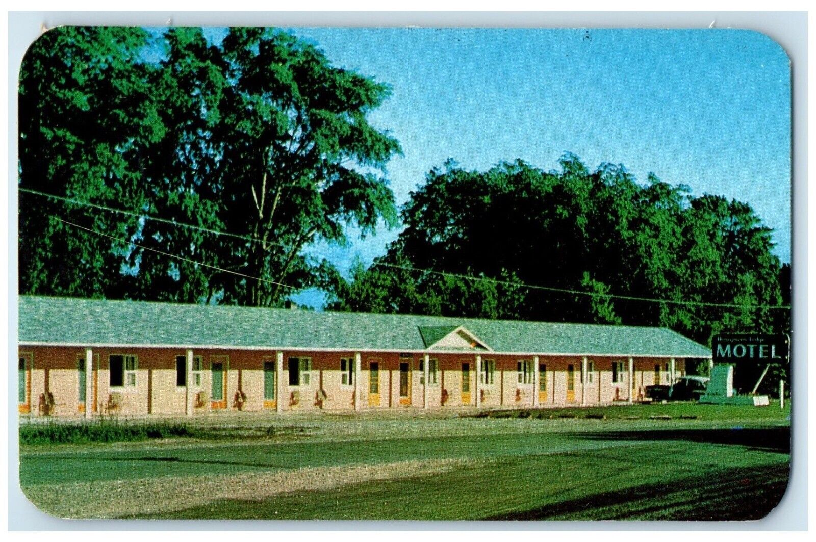 1955 Honeymoon Lodge Motel Crystal Lake Exterior Field Beulah Michigan Postcard