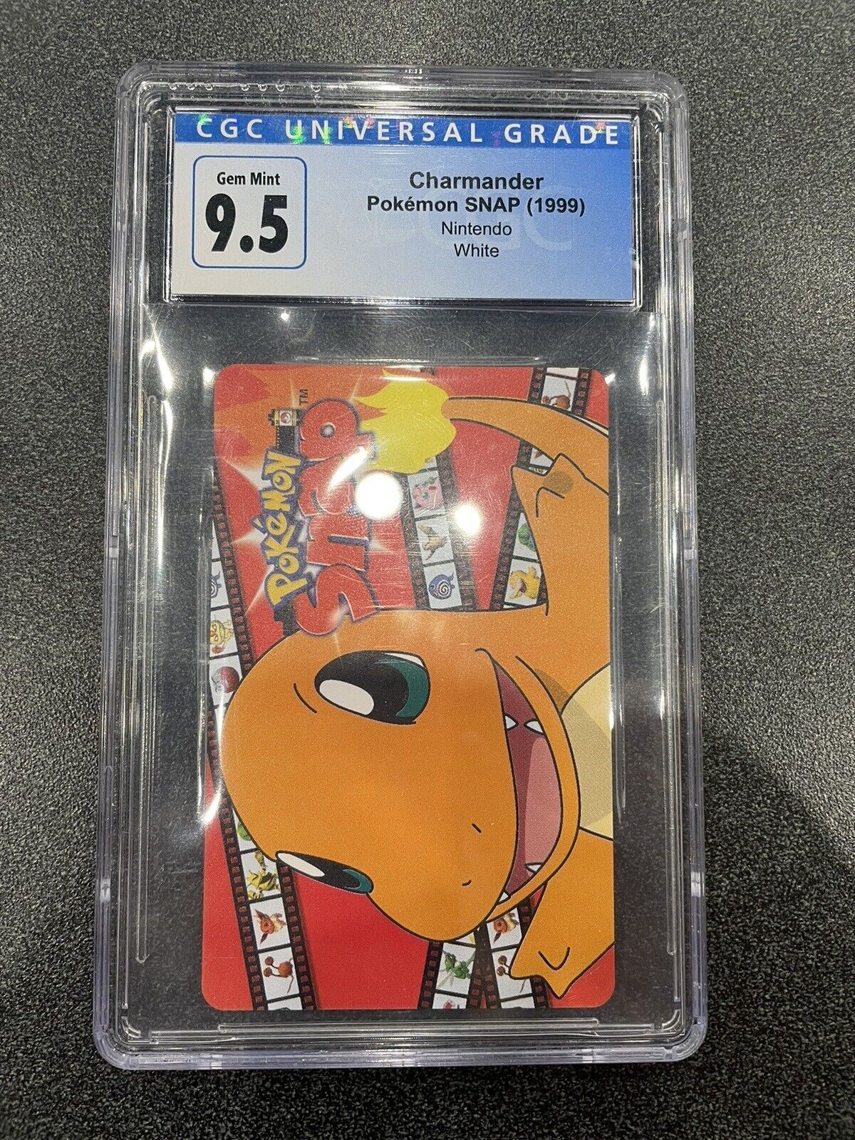 1999 CGC 9.5 Blockbuster Video Pokemon Charmander Snap Smart Card White