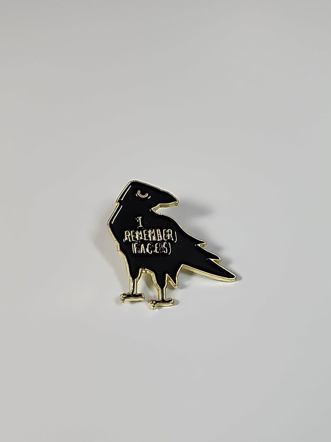 I Remember Faces Lapel Pin Angry Black Crow