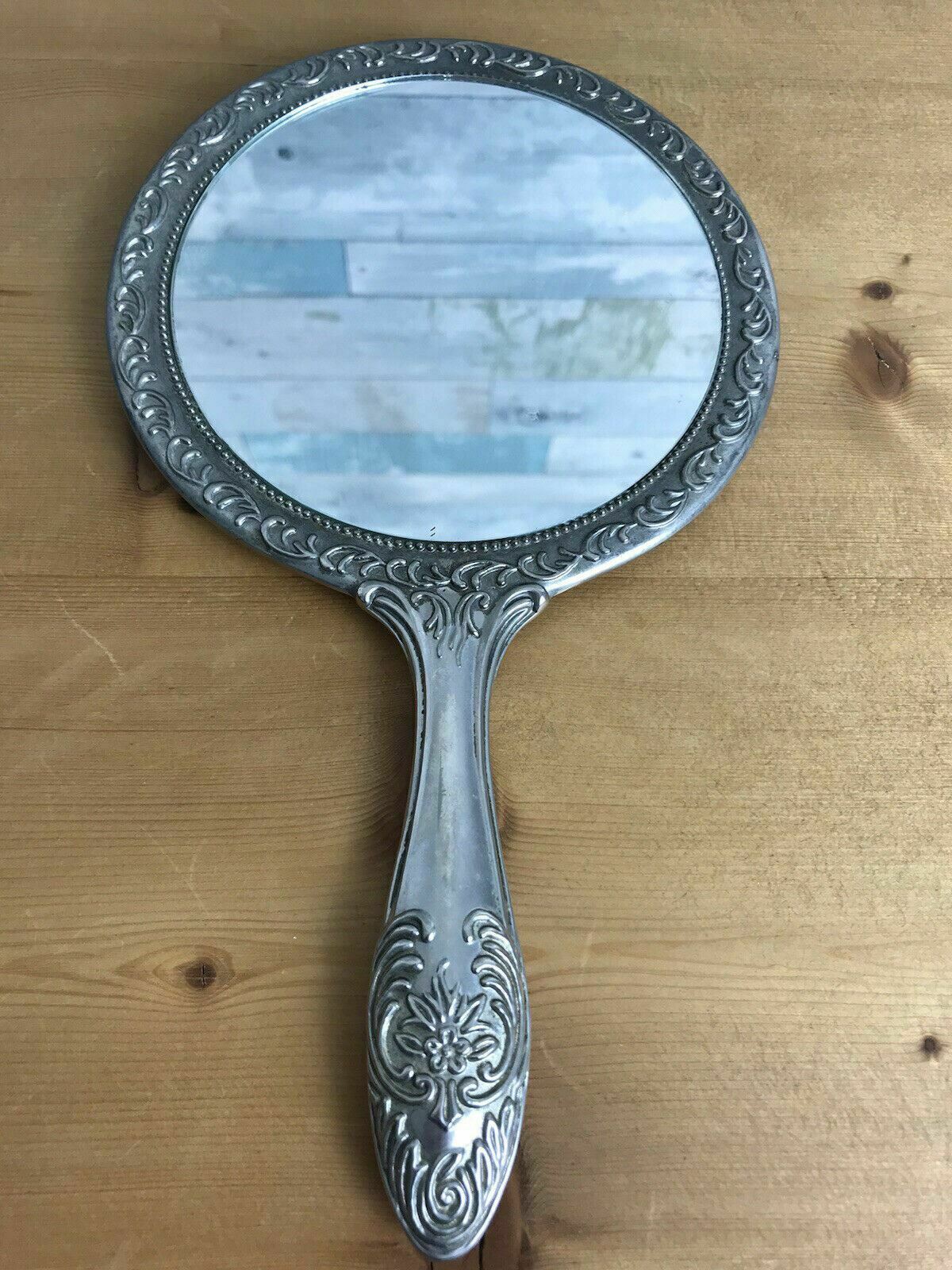 Attractive Victorian Style Handheld Mirror with Elegant Ornate Detail 