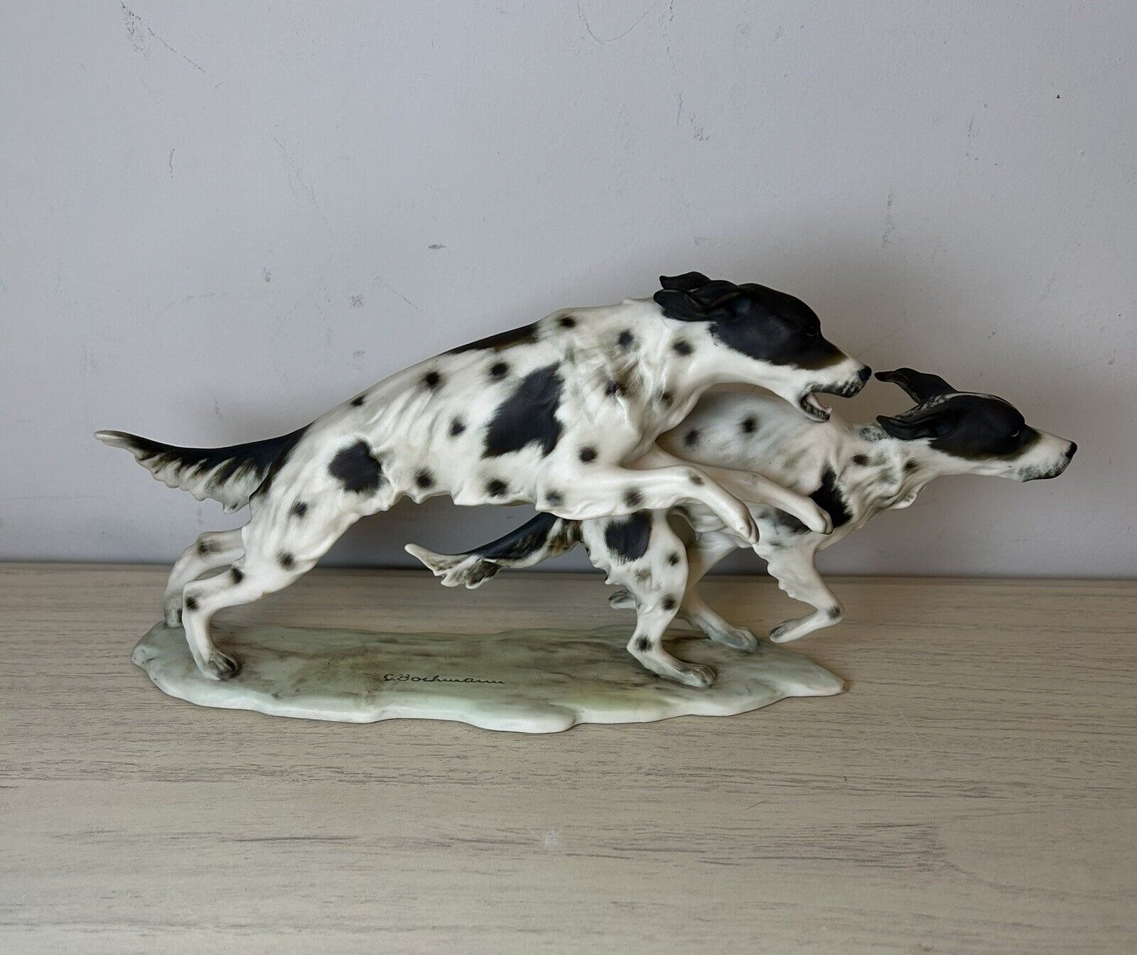 Kaiser Porcelain figurine of Two very active Running Dogs Black White