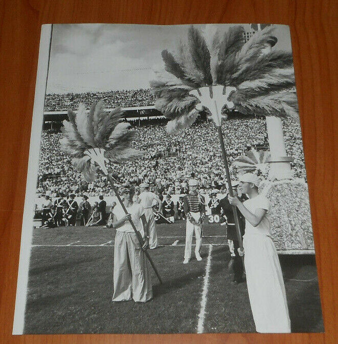 1960 Press Photo Miami Orange Bowl Halftime Show Guys Holding Exotic Fans