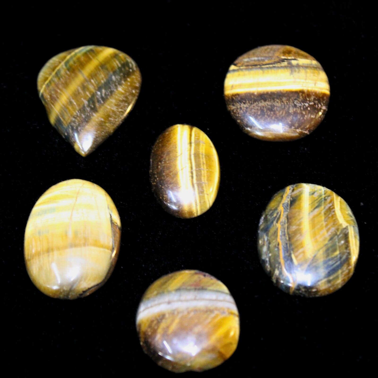 Introducing the 90g Polished Tiger Eye Cabochon 6 Piece Combo Pack from Crystals