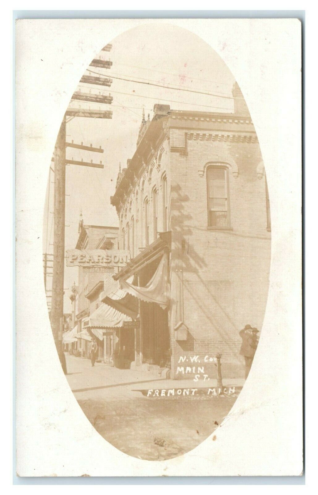 Postcard NW Corner Main St, Fremont Michigan pearson shoes dentist 1909 RPPC L49