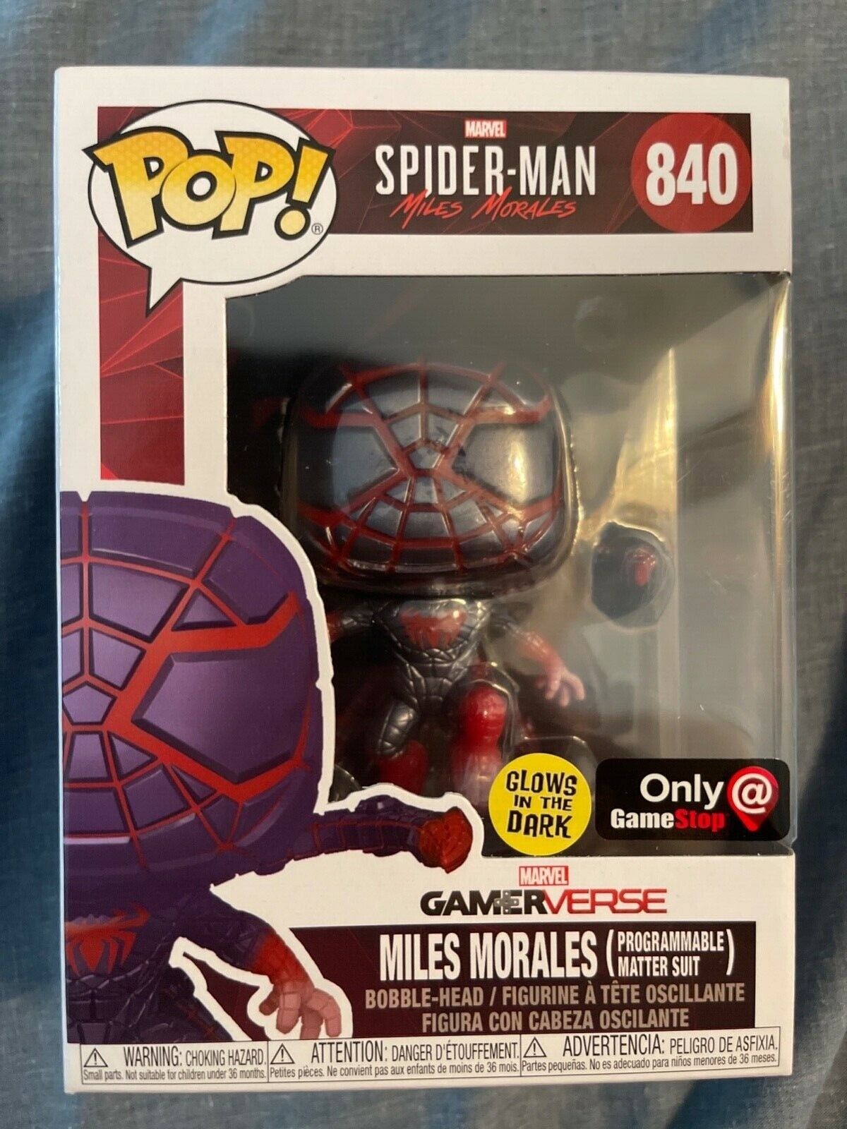 Miles Morales Funko pop with programmable matter suit. Glow in the dark bobble.