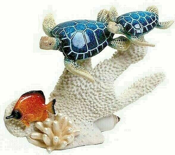Sea Turtles on Coral Reef with Fish Figurine