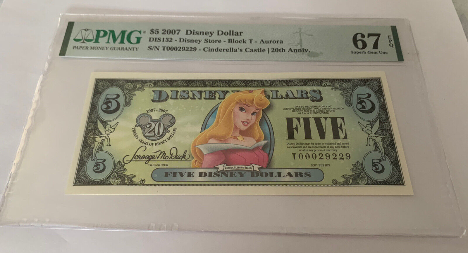 PMG-67 $5 2007 Disney Dollar Blick T Aurora 20th Anniv