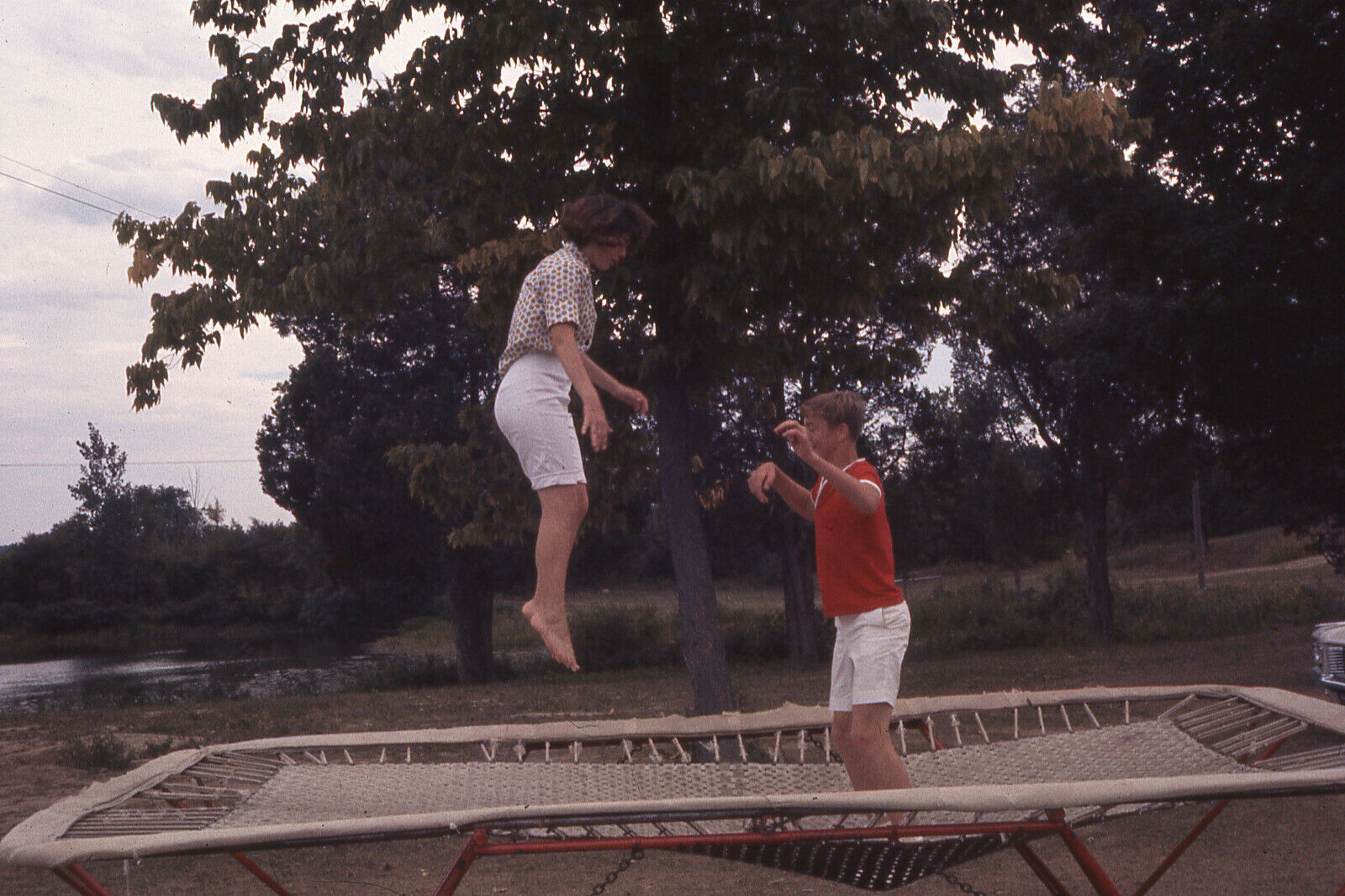 TEENAGE BOY & GIRL JUMPING ON A TRAMPOLINE 1965 PHOTO SLIDE #3